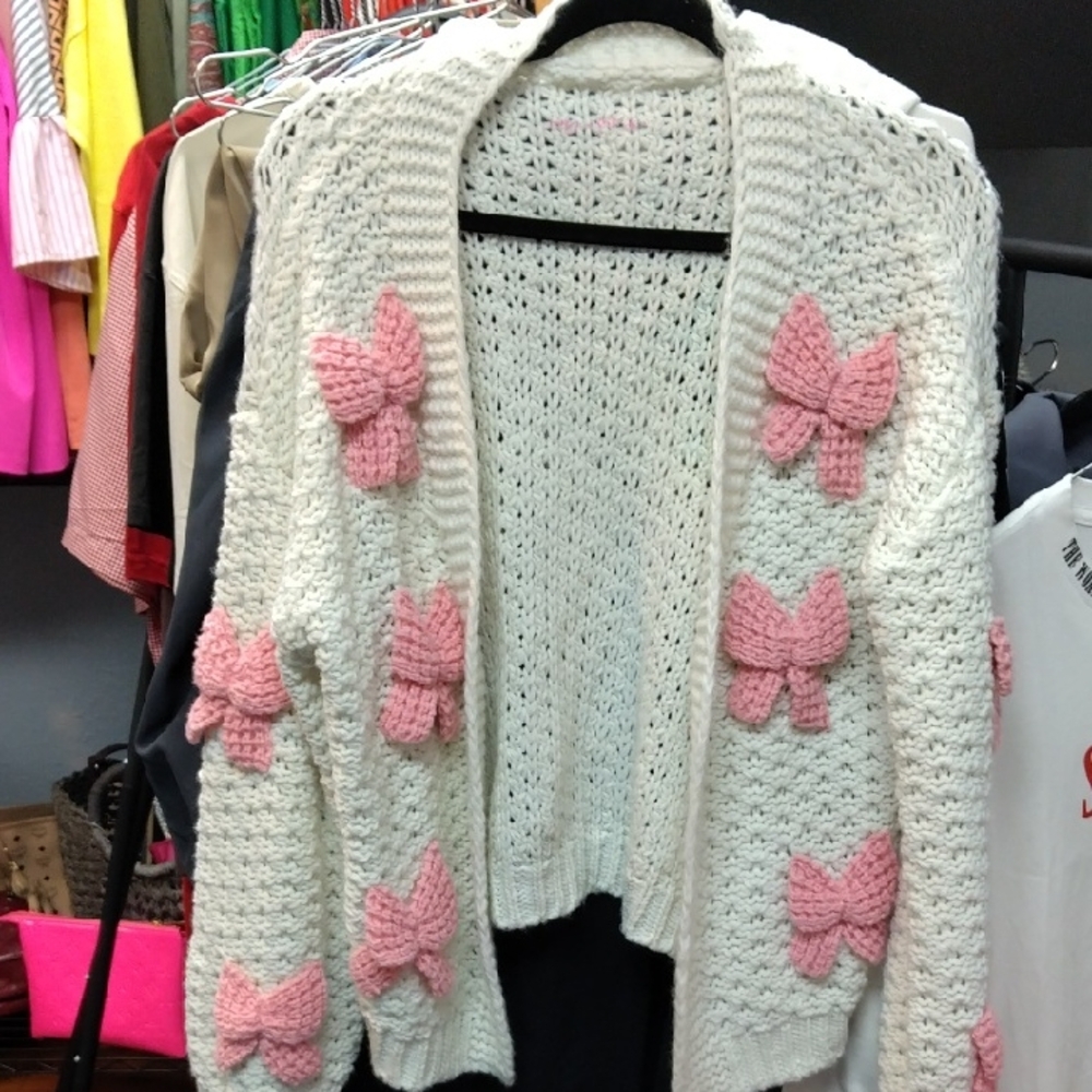 Cozy White Sweater with Pink Bow Accents